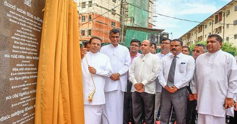 
Sri Lankan President Maithripala Sirisena hands over modern houses to 437 low income families in Colombo 