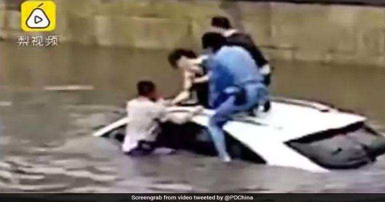 She Was Trapped Inside Sinking SUV. Strangers Came Together To Rescue Her